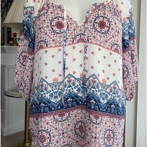 Very nice comfortable cold shoulder blouse